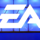 A massive EA logo appears in front of a wall of blue displays at a trade show-style event.